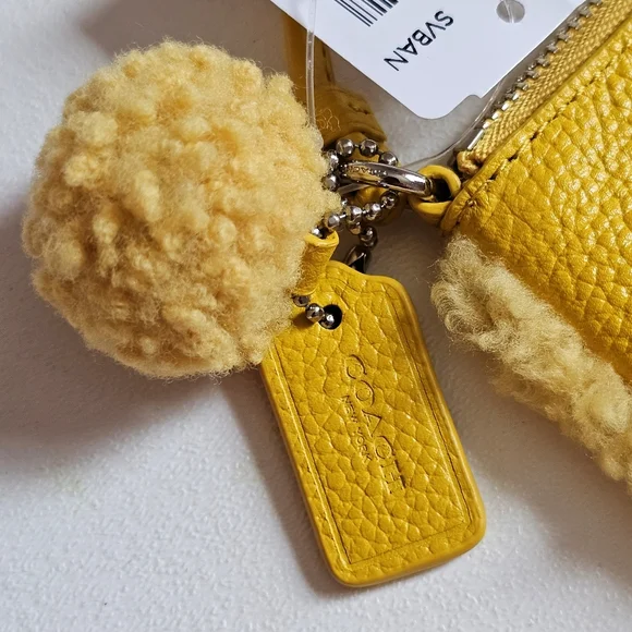 Vintage NWT Coach Shearling Small Wristlet in Banana Yellow With Pom Pom - Picture 11 of 16